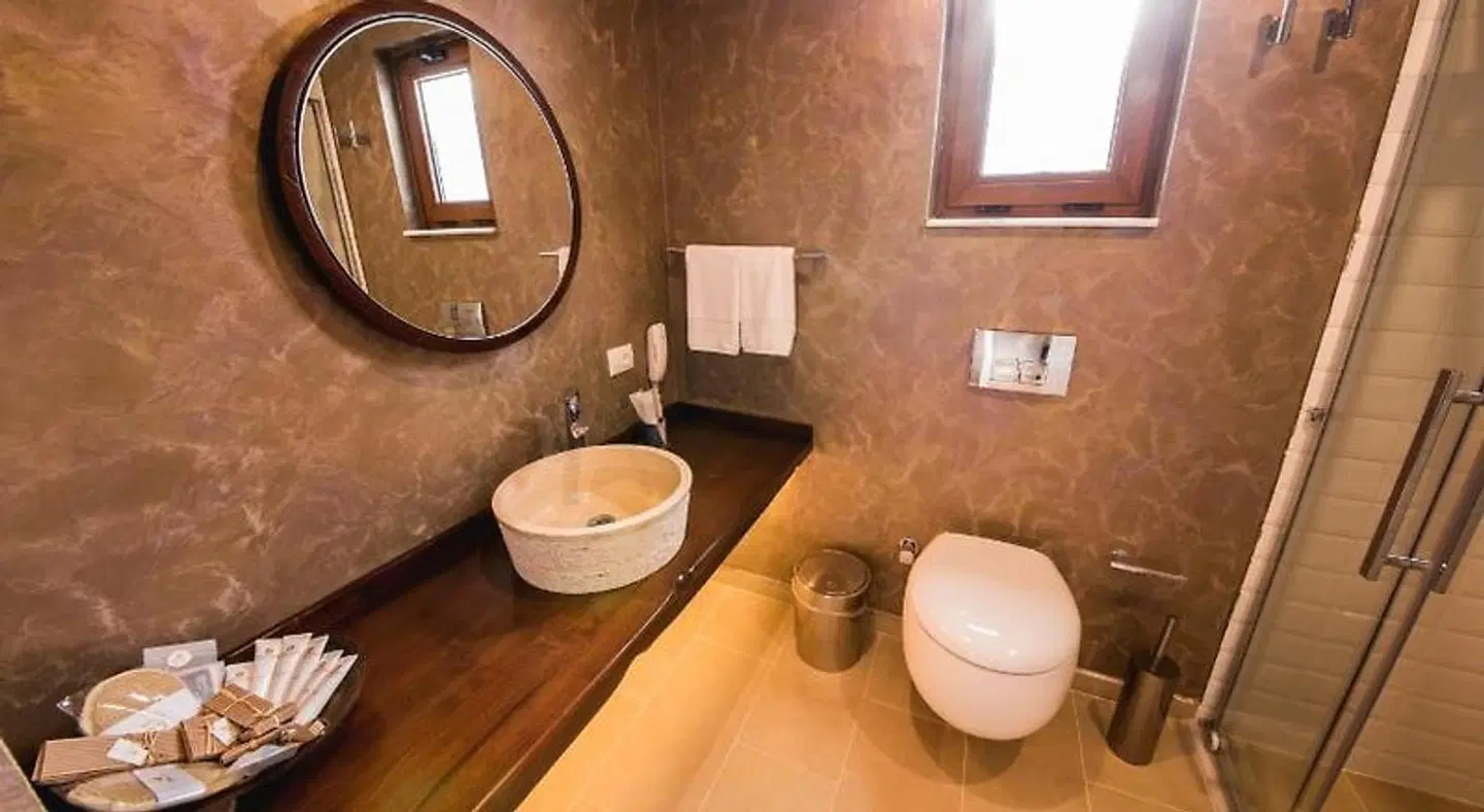 Suna Sun Boutique Hotel Badezimmer