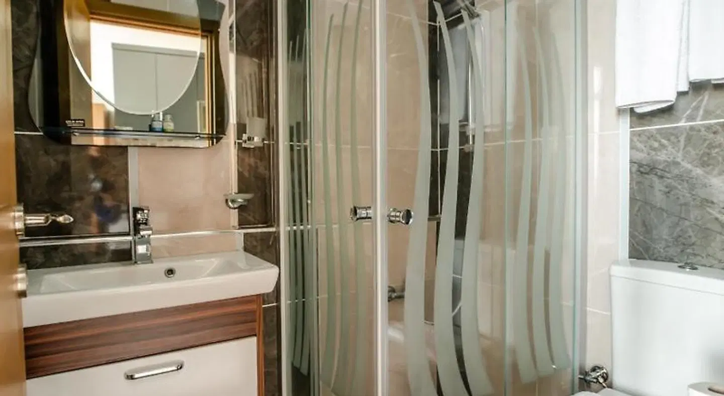 Camelot Apartment Badezimmer
