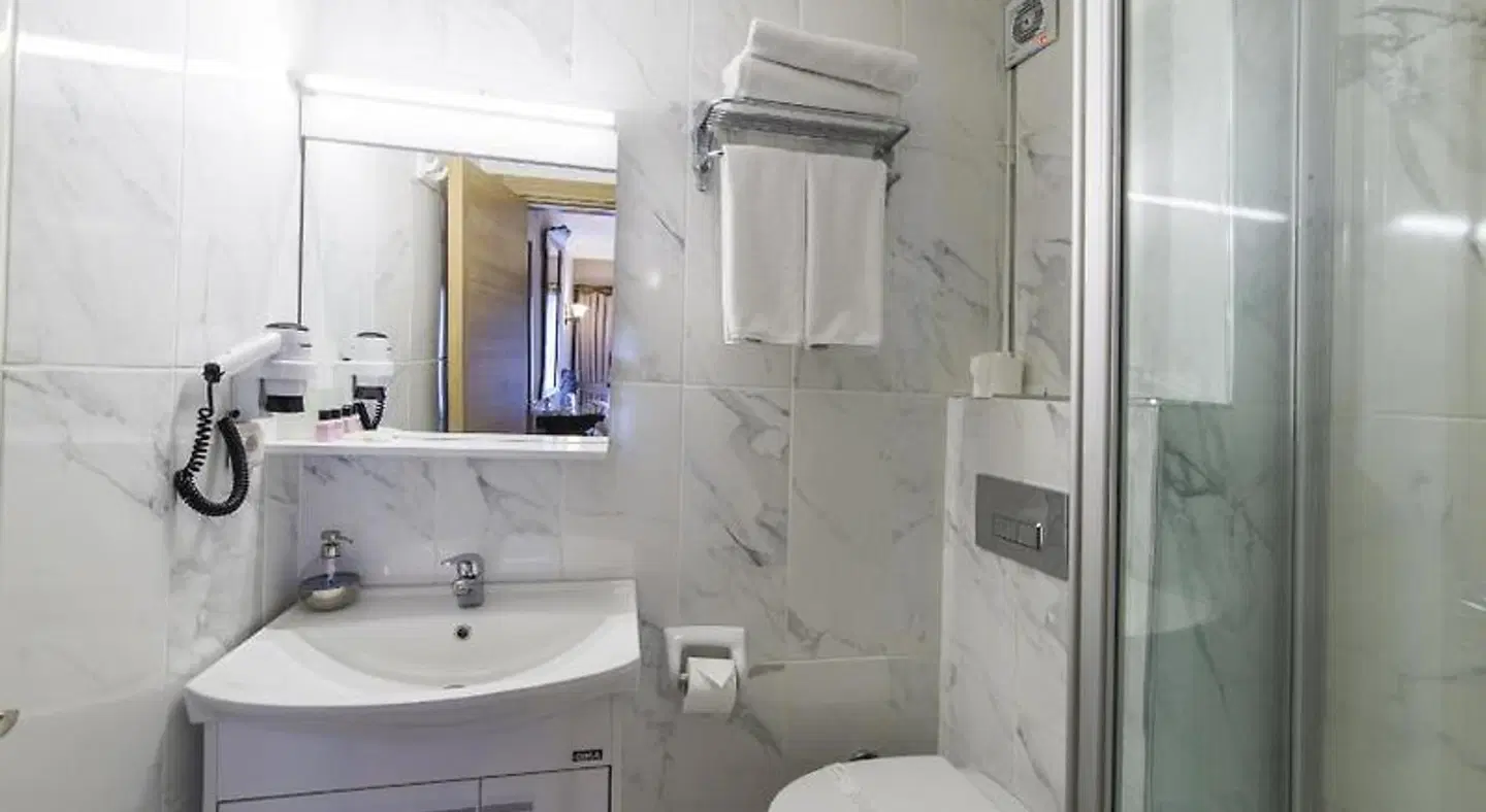 Naz Wooden House Inn Badezimmer