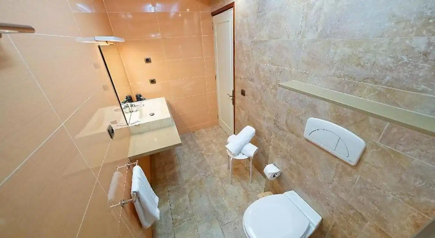 Apartamentos Cocoteros Badezimmer