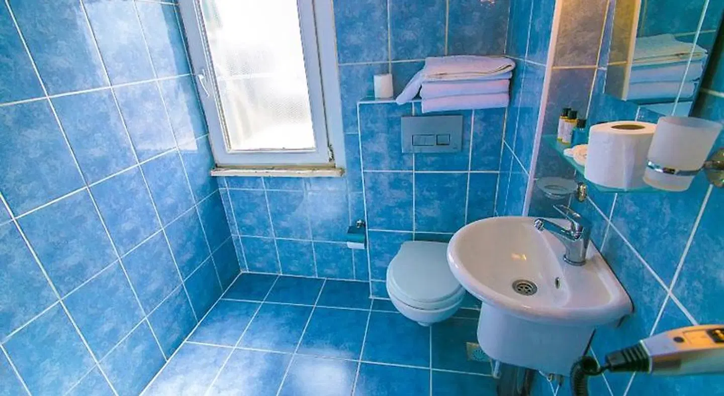 Ancient Town Hotel Badezimmer