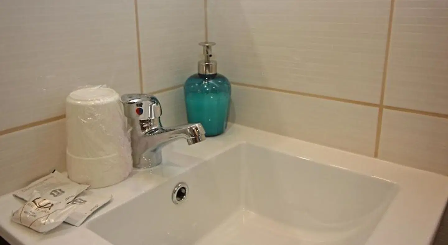 Encostas da Torre Badezimmer