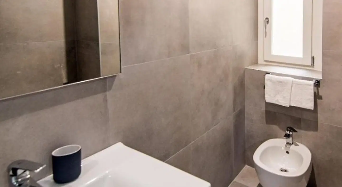 DOMO Apartments - Trieste Goldoni Badezimmer