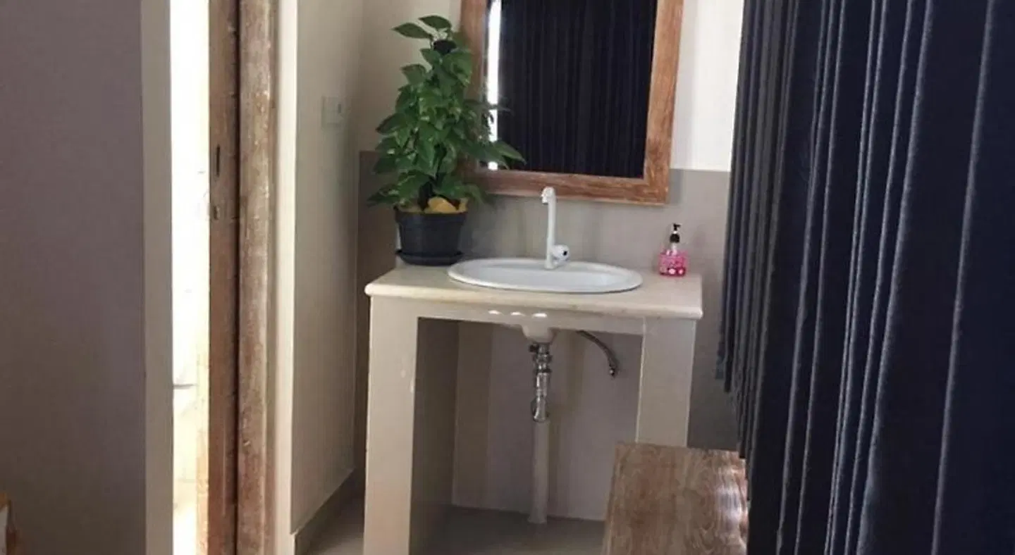 Laksmi Guest House Badezimmer