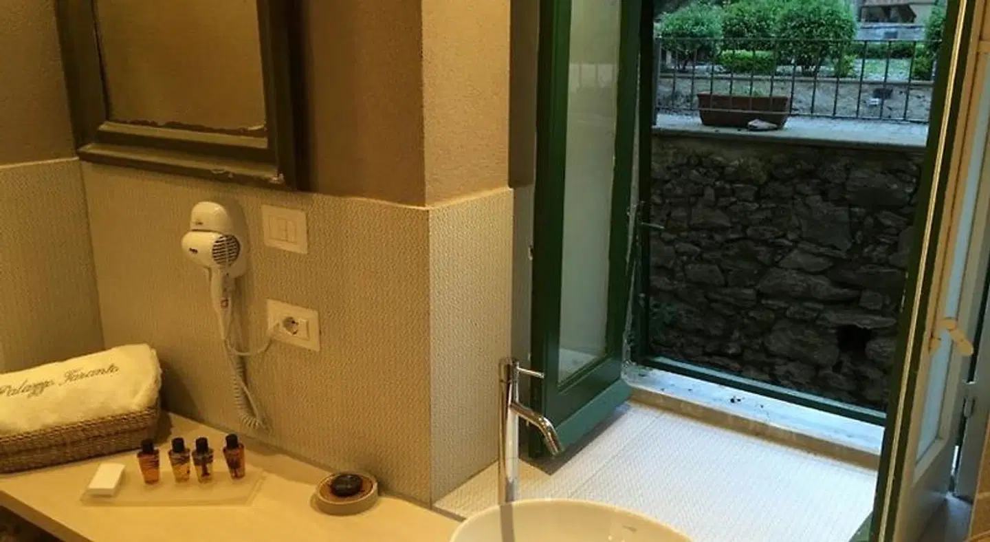 Palazzo Taranto Luxury Rooms Badezimmer