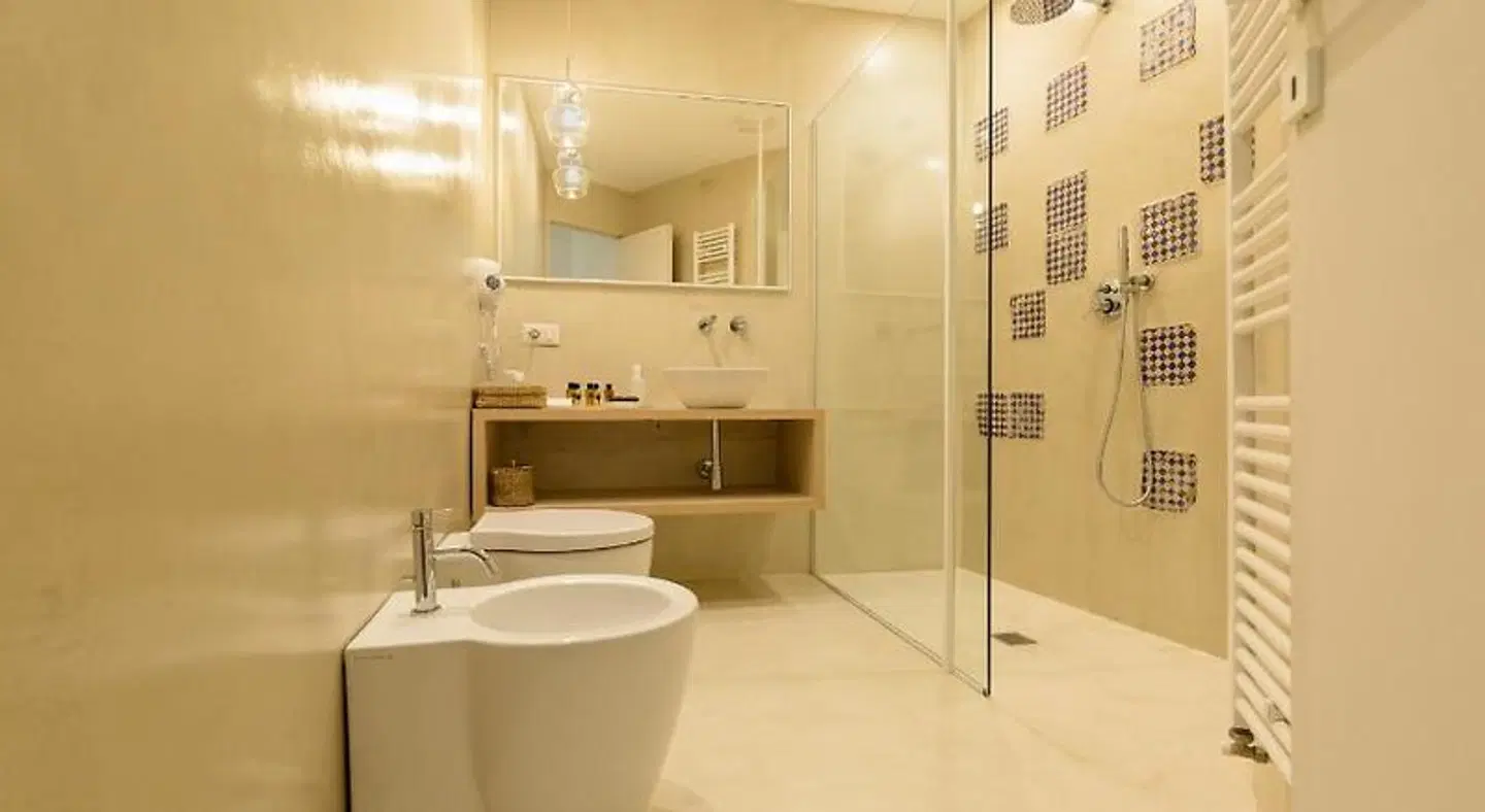 Palazzo Taranto Luxury Rooms Badezimmer