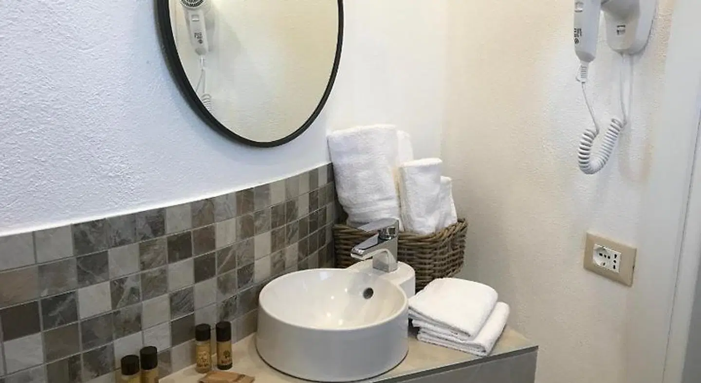 Hotel Cambogia Badezimmer