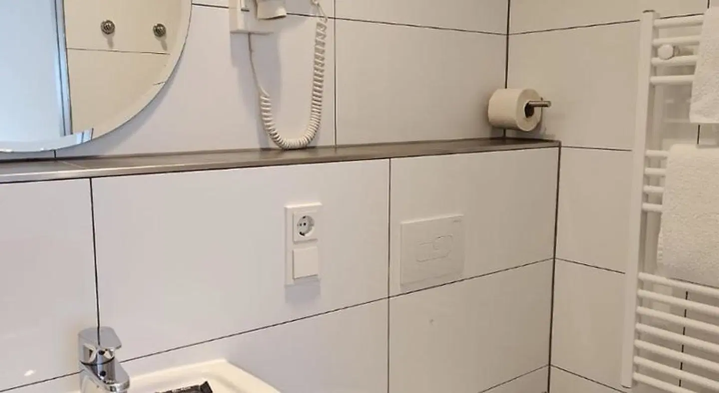 Minsu Hotel Badezimmer