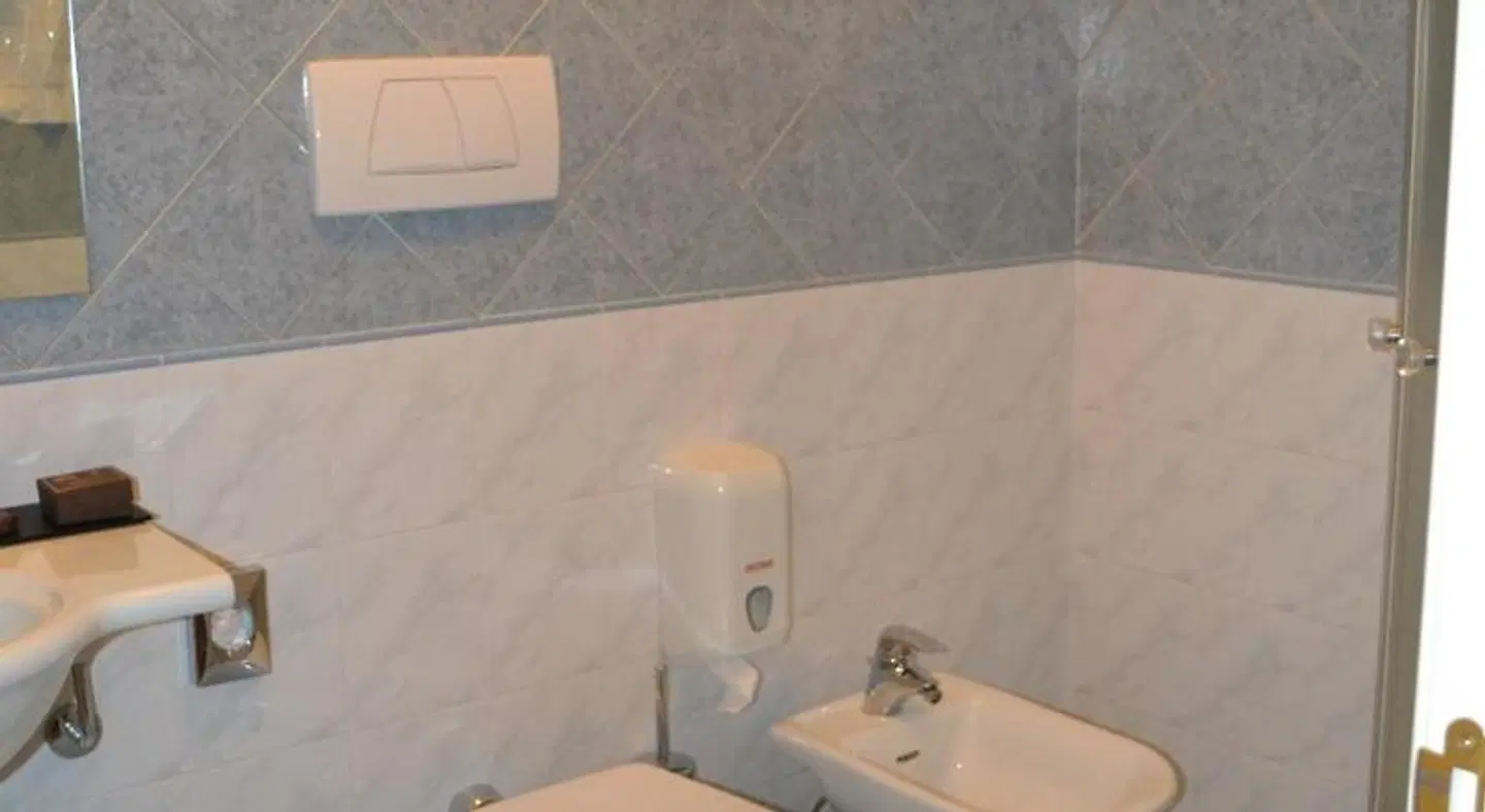 Tricolore Hotel Badezimmer