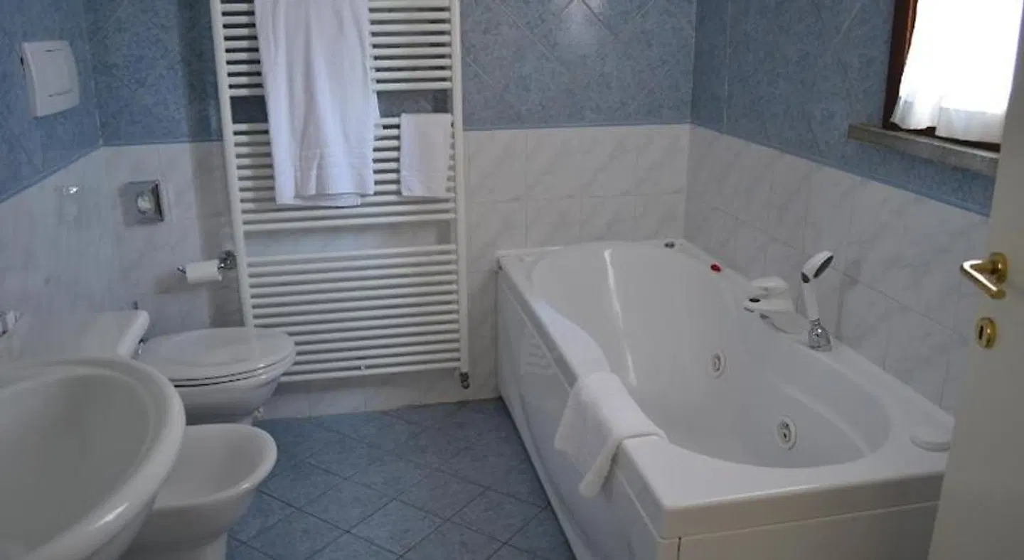 Tricolore Hotel Badezimmer