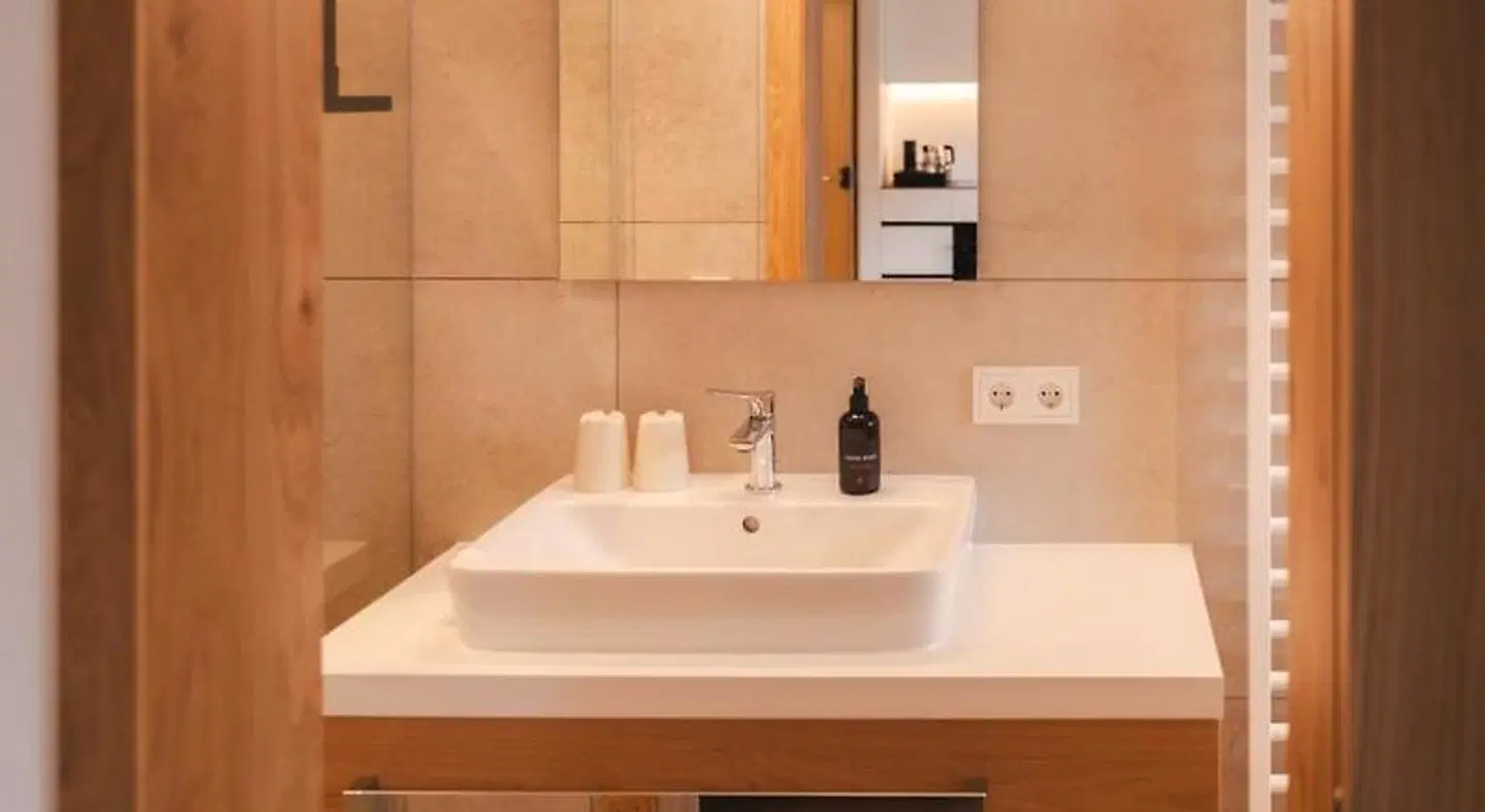 Aparthotel Hubertus Badezimmer