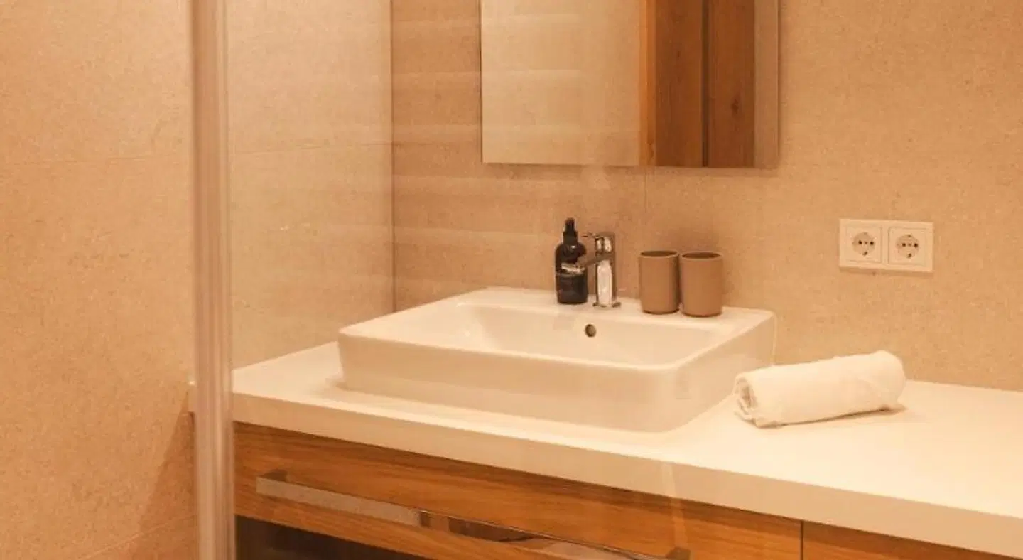 Aparthotel Hubertus Badezimmer