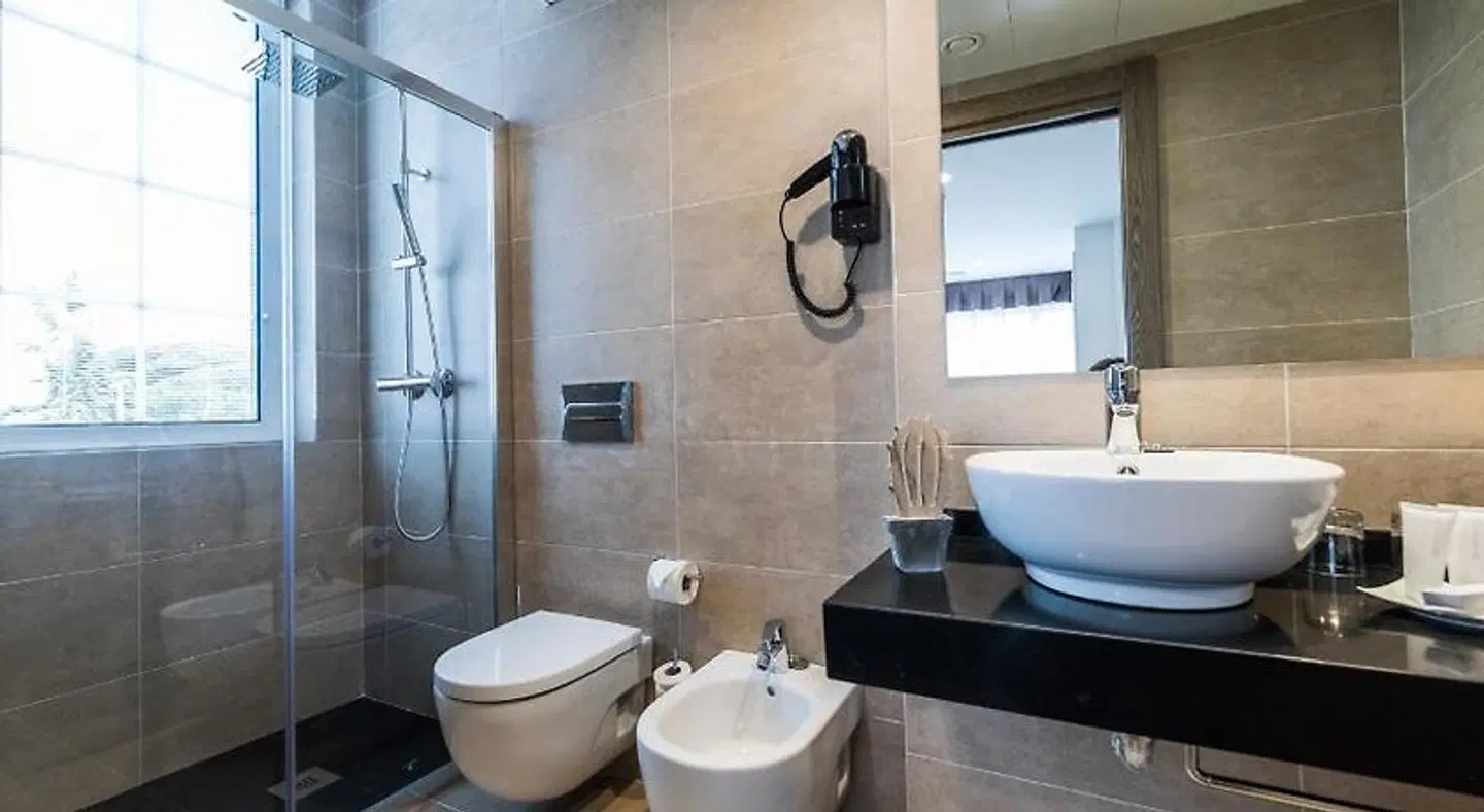 Suite Home Pinares Badezimmer