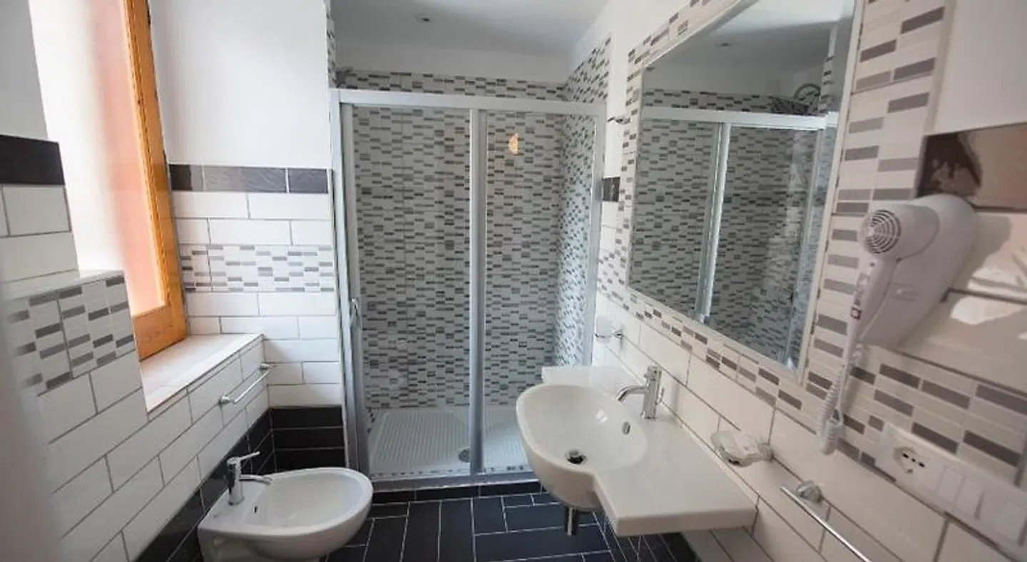 Donna Rosa Accommodation Badezimmer
