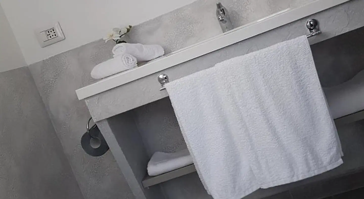 Illuvia Affitto Camere Badezimmer
