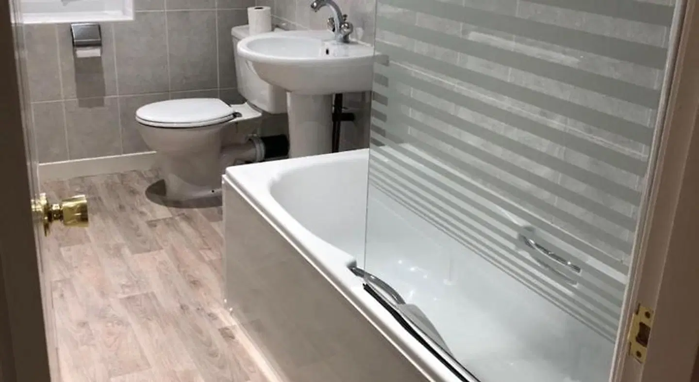 Burton Lodge Guest House Badezimmer