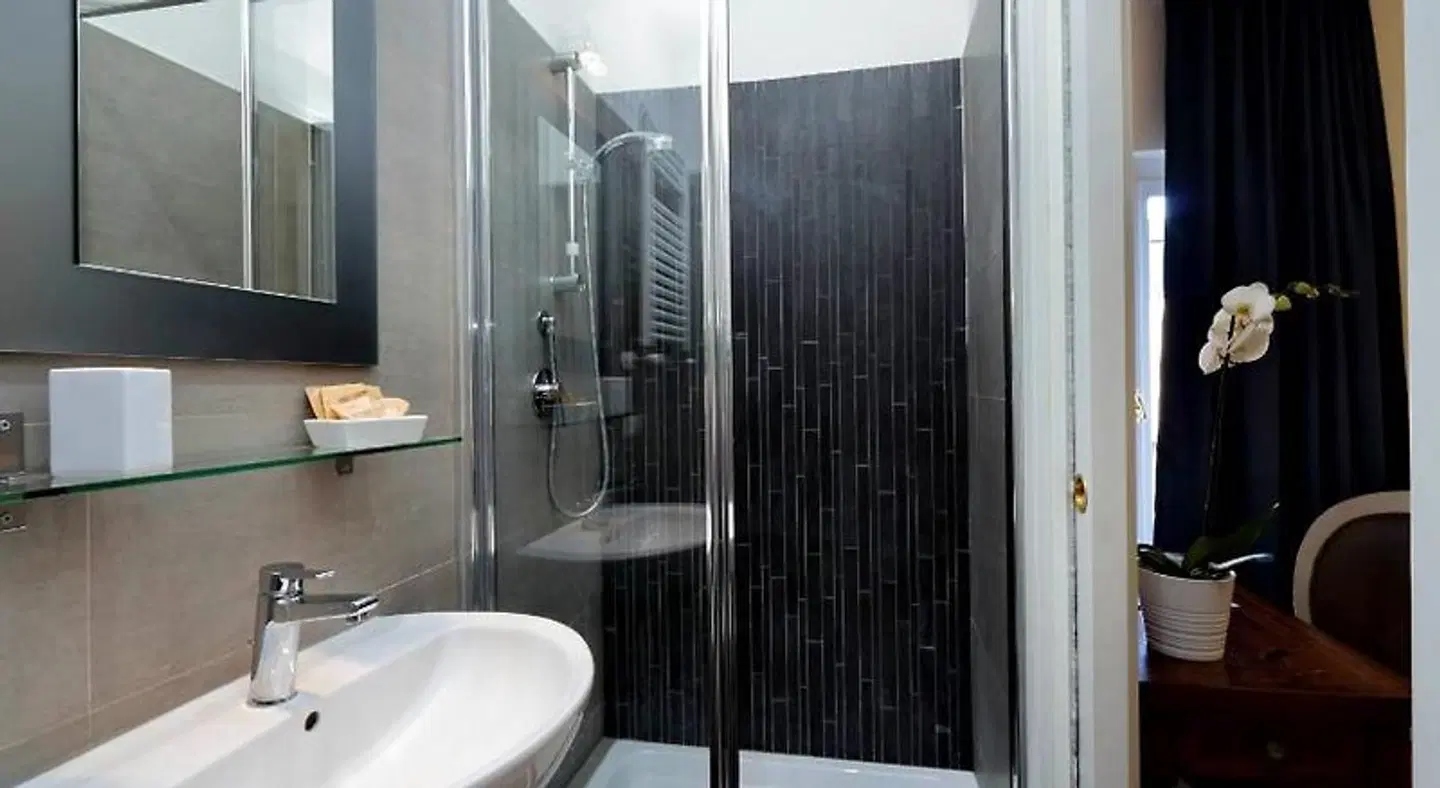Near Home Smart Suites Badezimmer