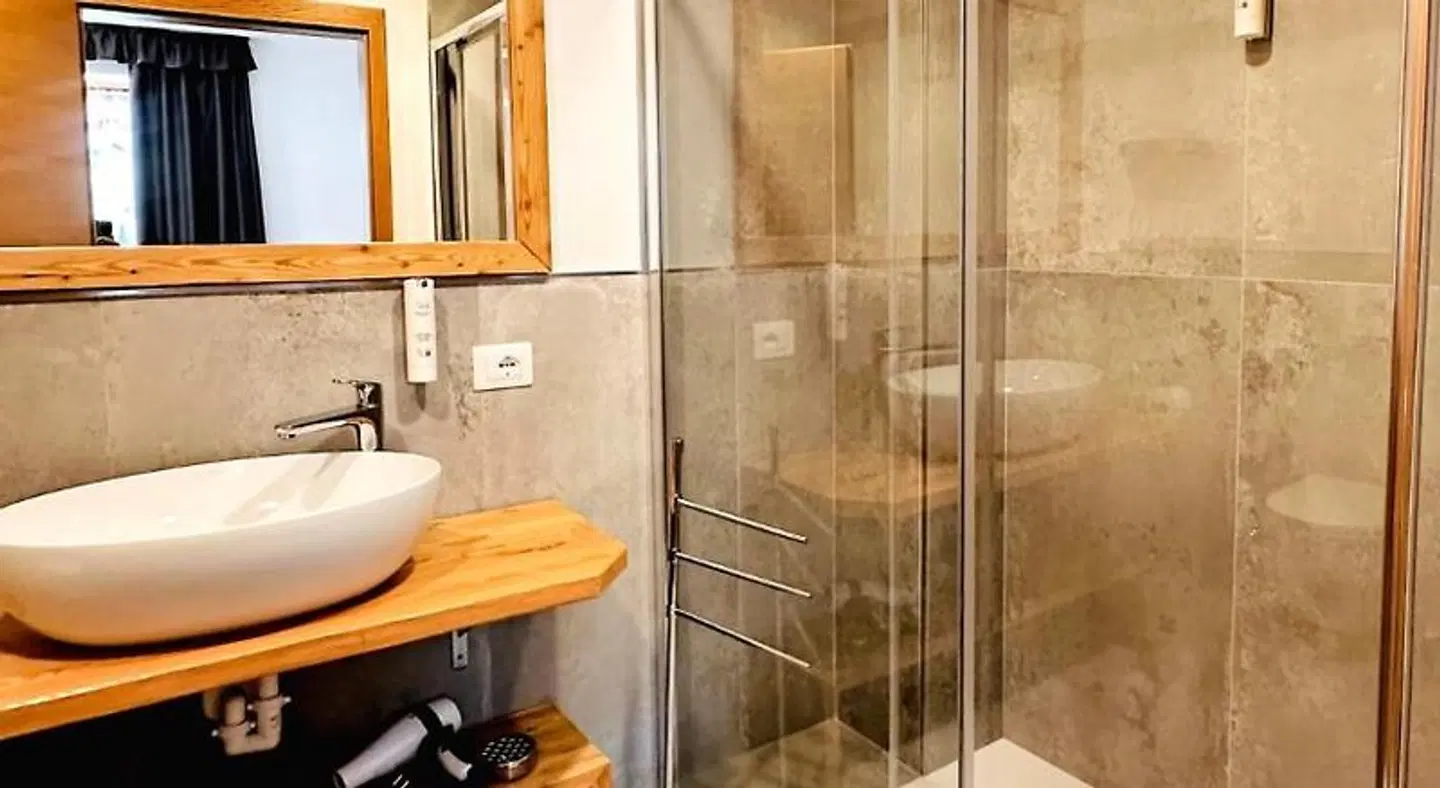Alpenlife Hotel Someda Badezimmer