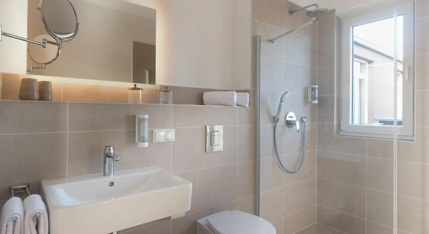 Atrium Apart Hotel Bruhl Badezimmer