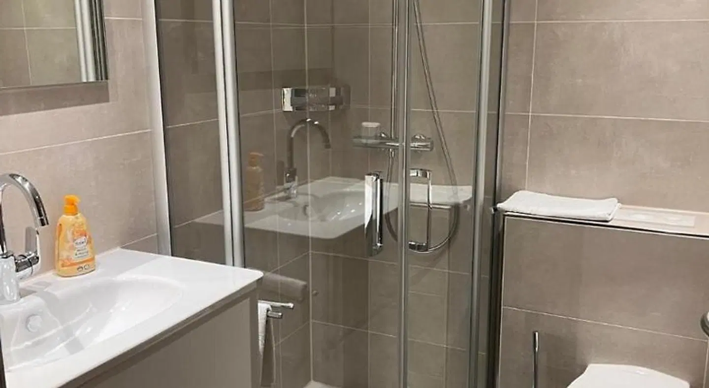 Appartementhaus Vierjahreszeiten Badezimmer