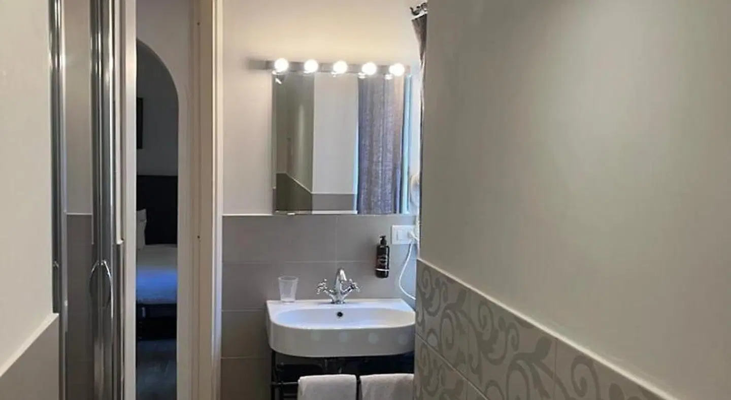 Giuturna Boutique Hotel Badezimmer