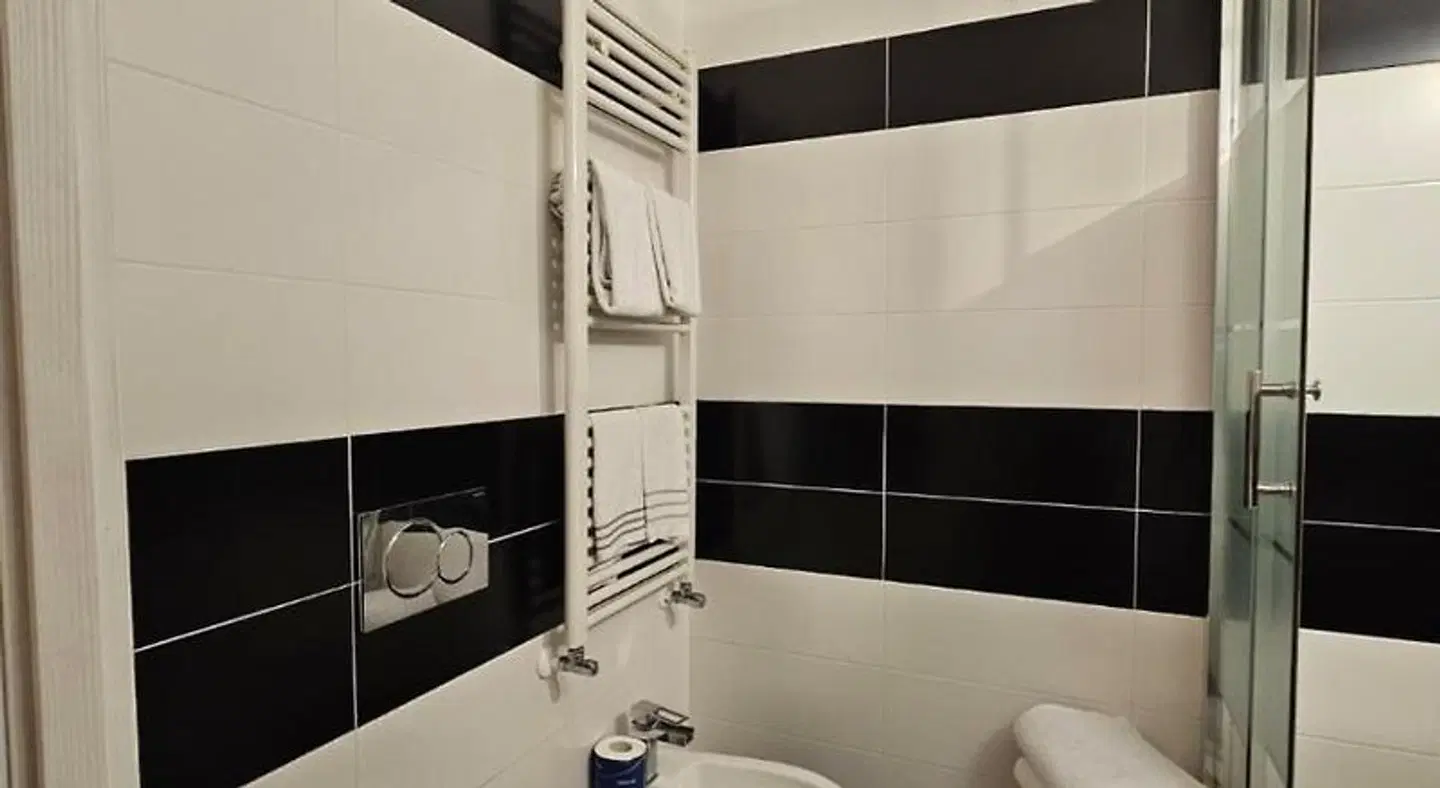 Giuturna Boutique Hotel Badezimmer