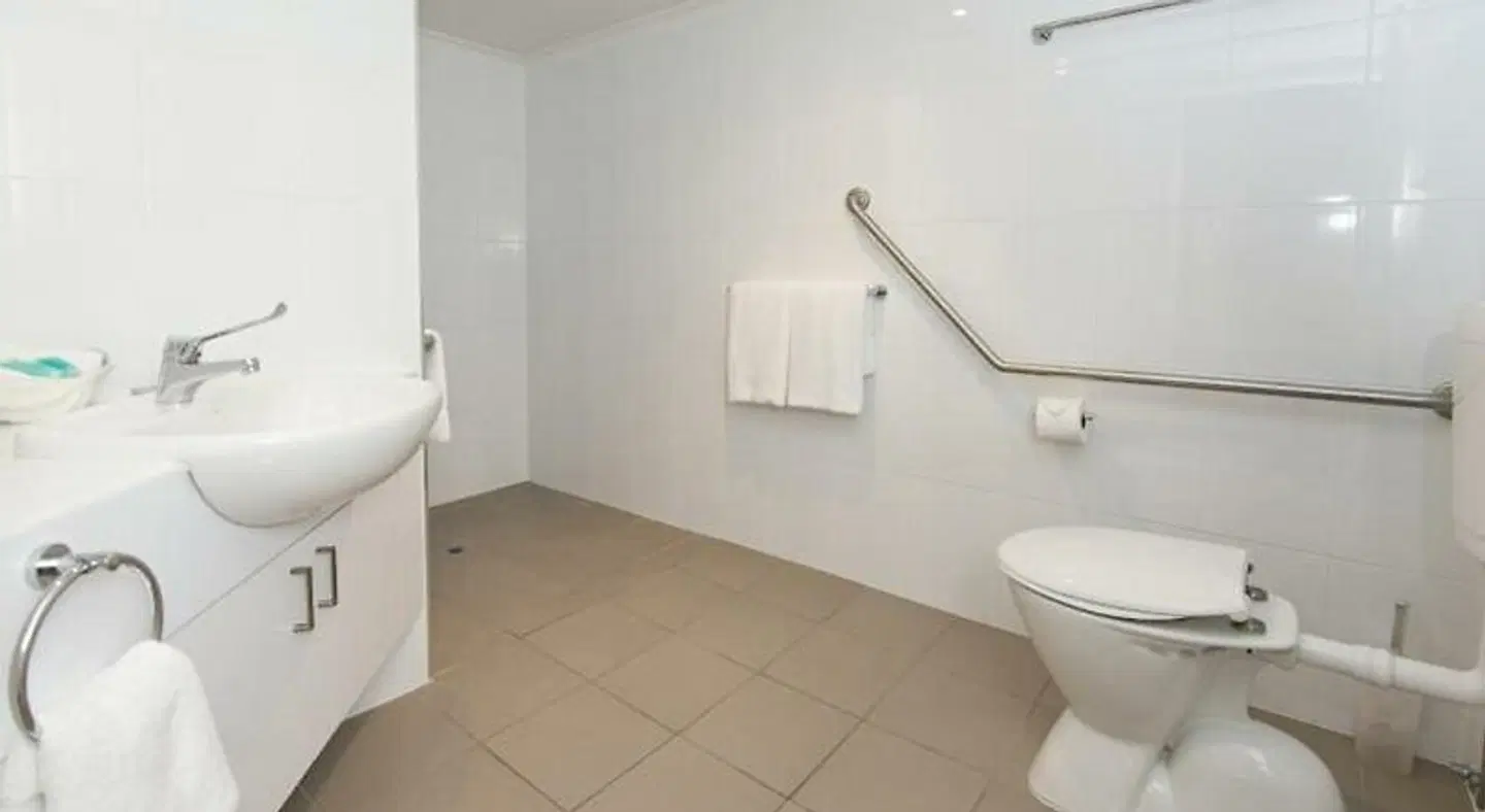 Macrossan House Boutique Holiday Apartments Badezimmer