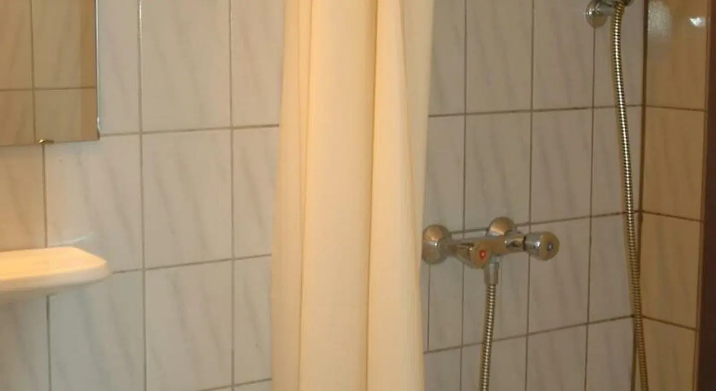 Buch-Ein-Bett Hostel Badezimmer