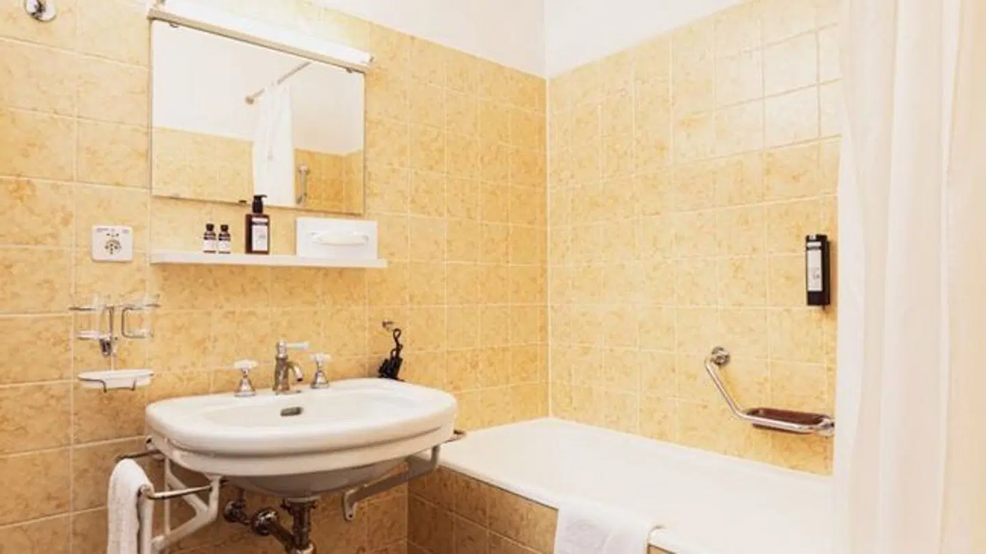 Alpina Kurhaus Badezimmer