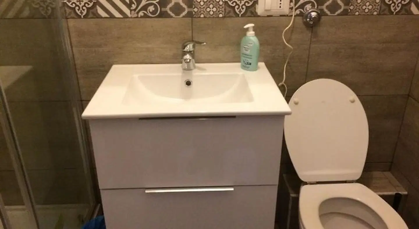 Quest House Lihong Badezimmer
