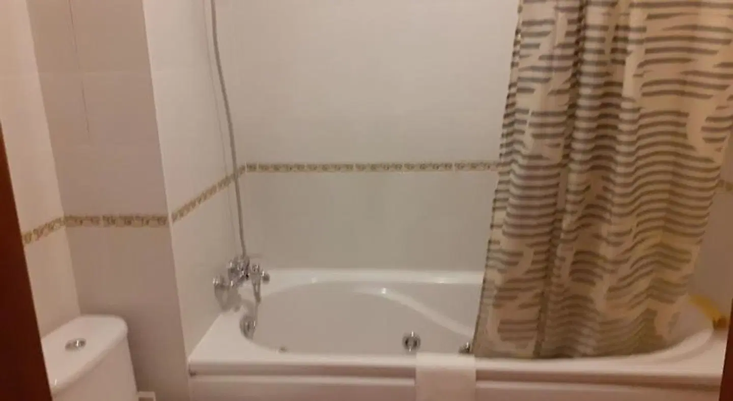 Clube da Meia Praia Badezimmer