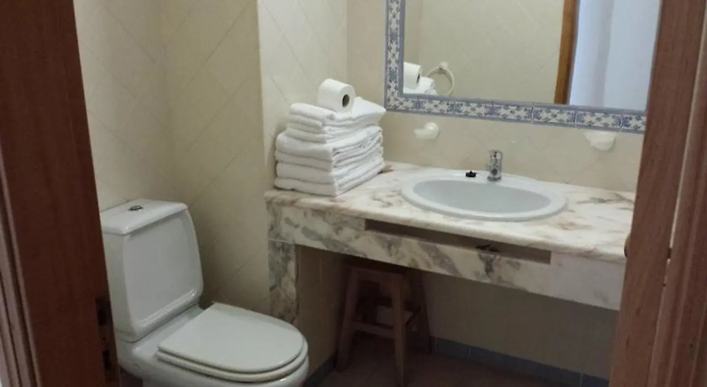 Clube da Meia Praia Badezimmer