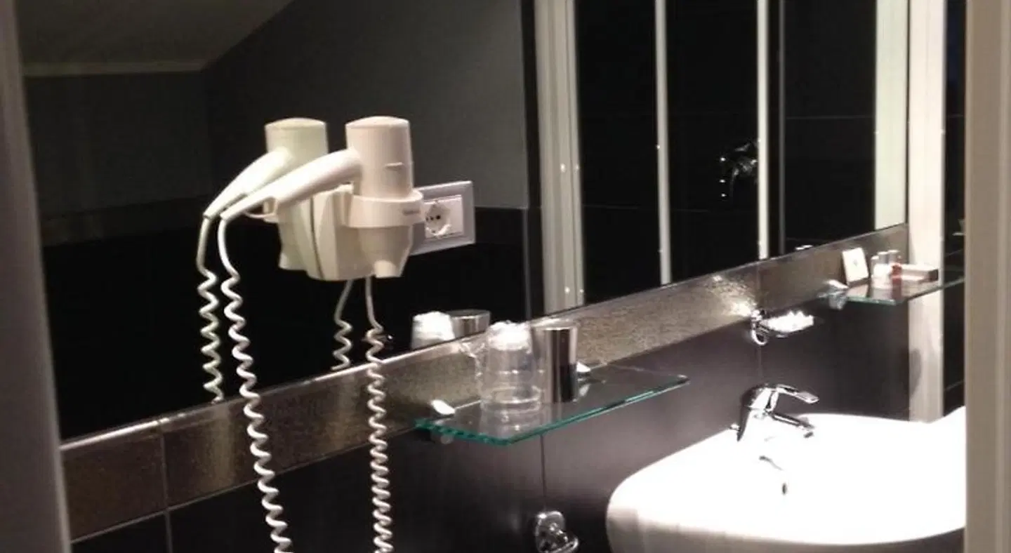Savoia Hotel Regency Badezimmer