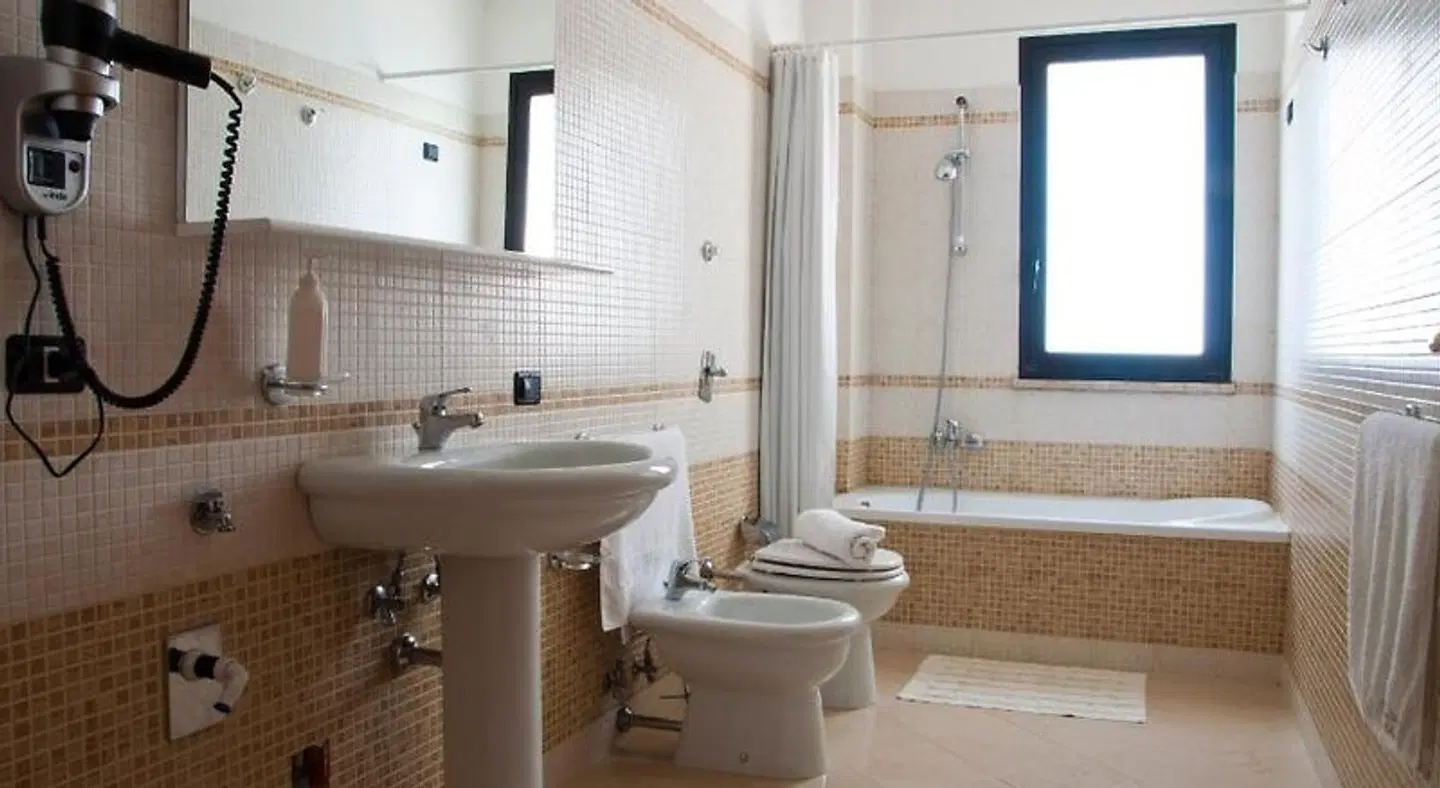 Residence Le Saline Badezimmer