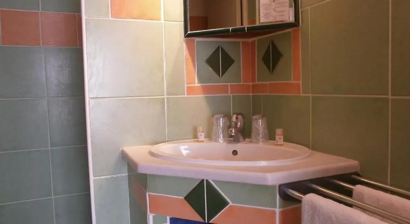 Hôtel La Potiniere Badezimmer