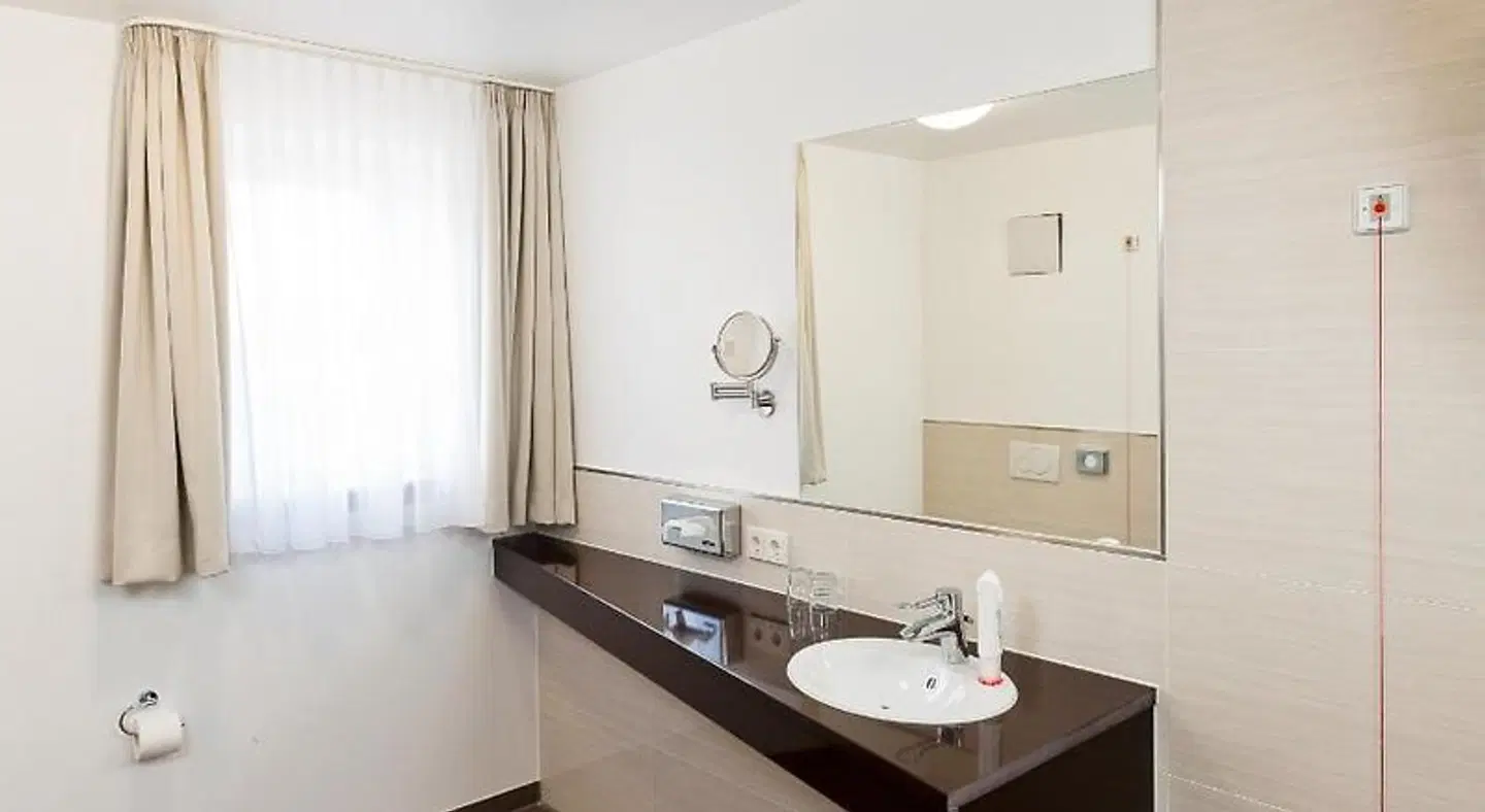 Komforthotel Butjadinger Tor Badezimmer