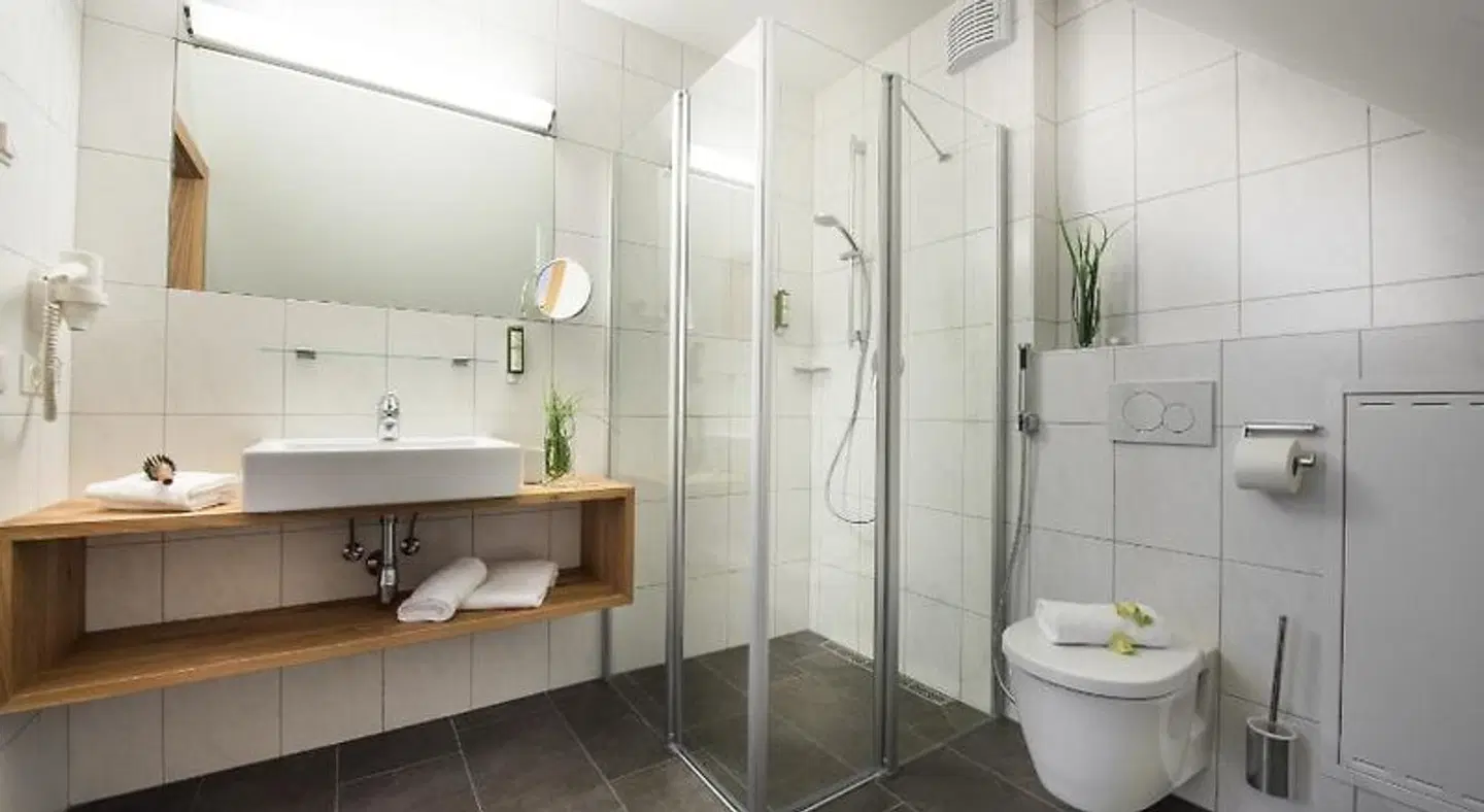 AlpenParks Hotel & Apartment Orgler Badezimmer