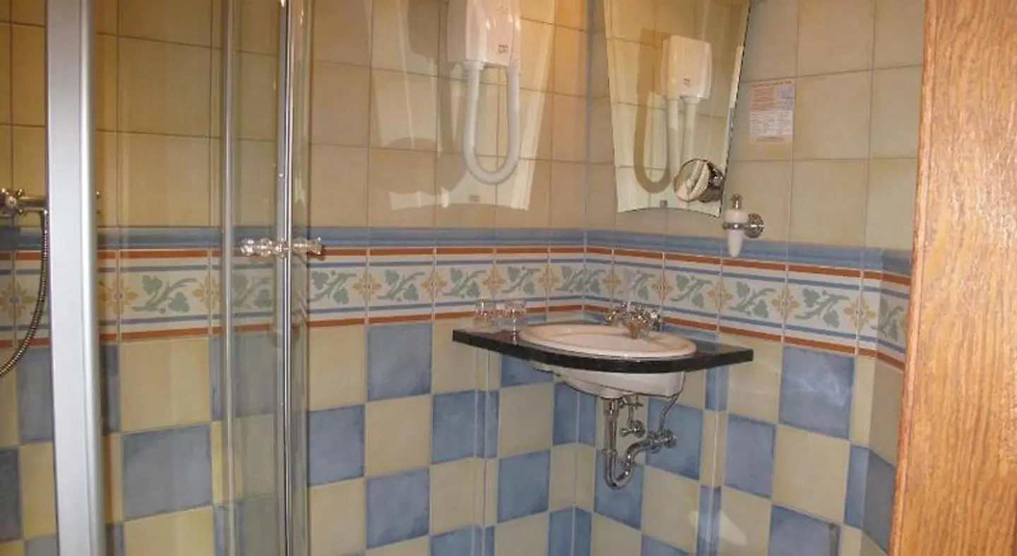 Hostellerie Les Magnolias Badezimmer