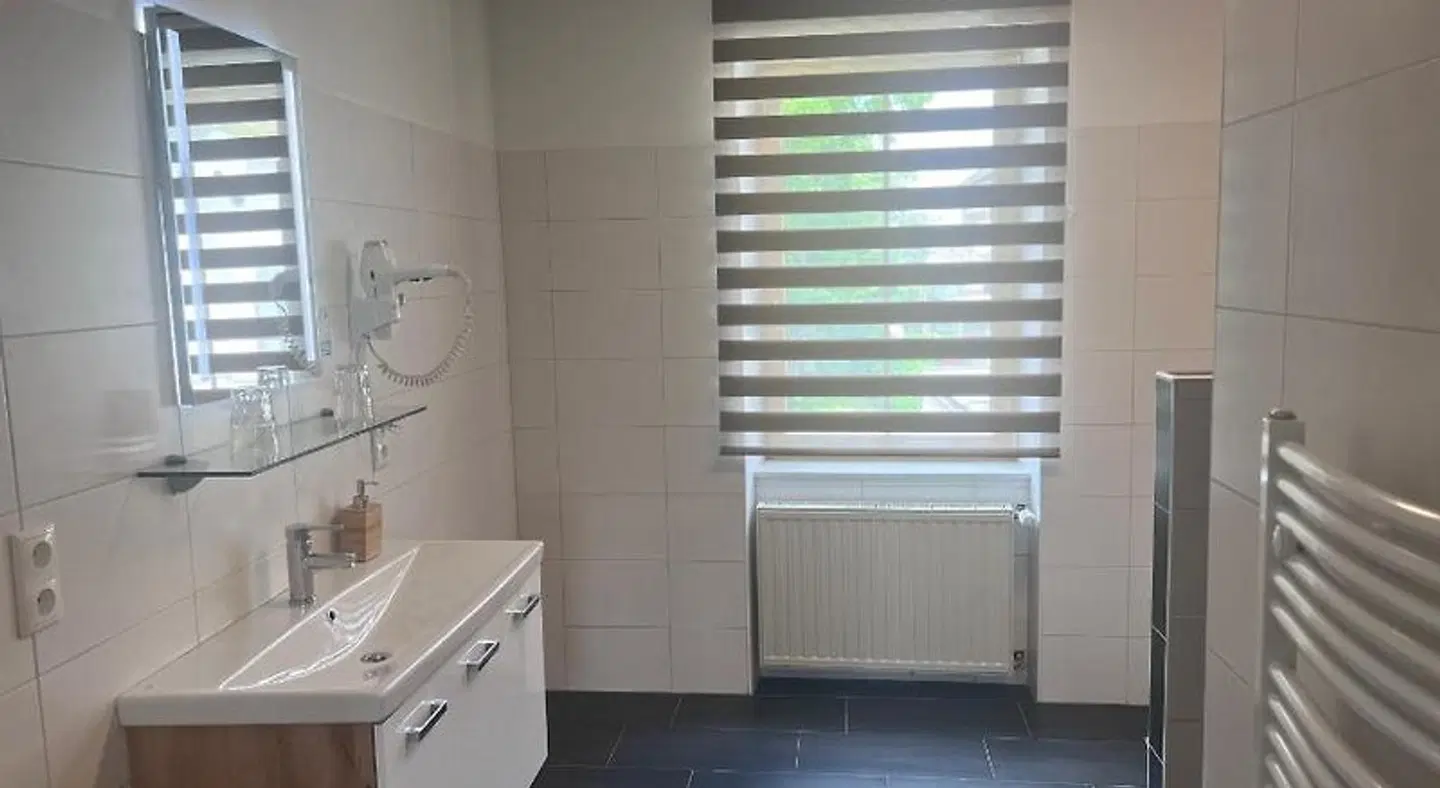 Gasthaus & Hotel Backhendlstation Badezimmer