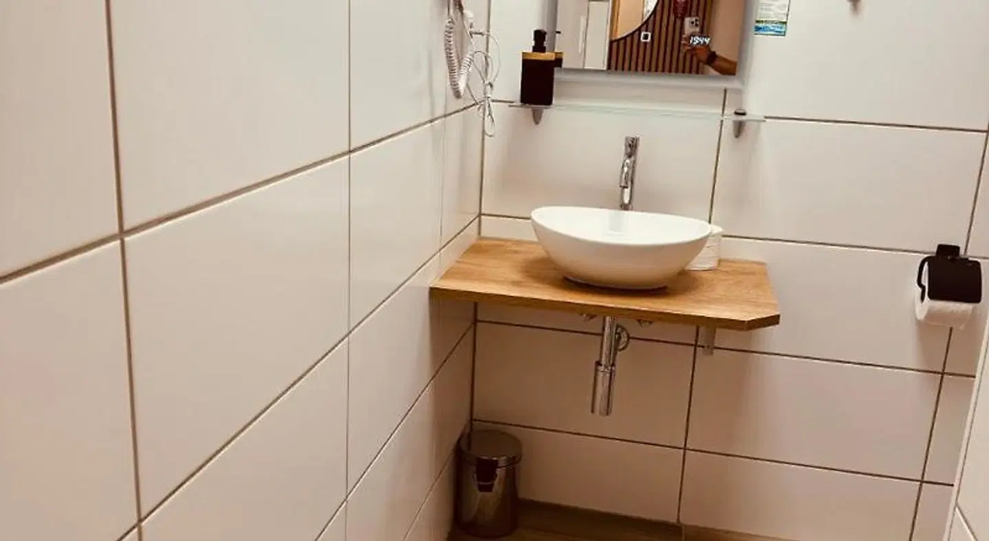 Gasthaus & Hotel Backhendlstation Badezimmer
