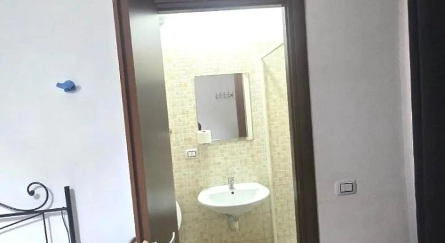 Meltin' Rome Guest House Badezimmer