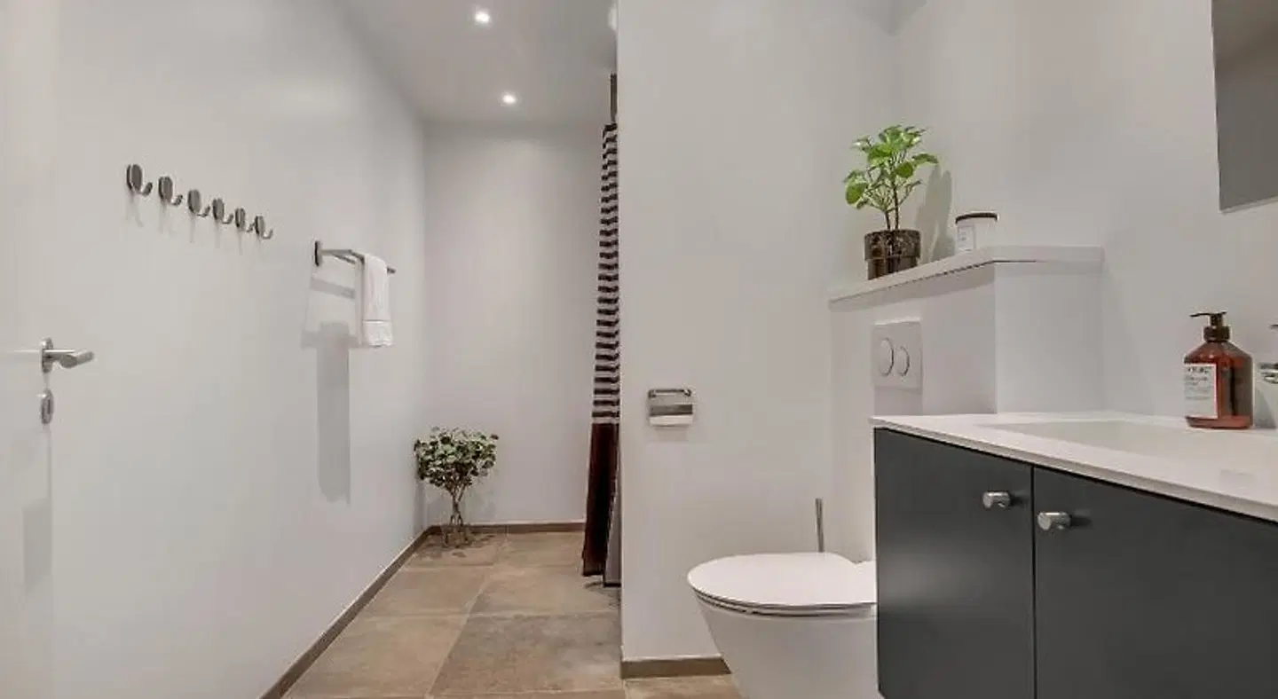 NORD Hotel Apartments Badezimmer