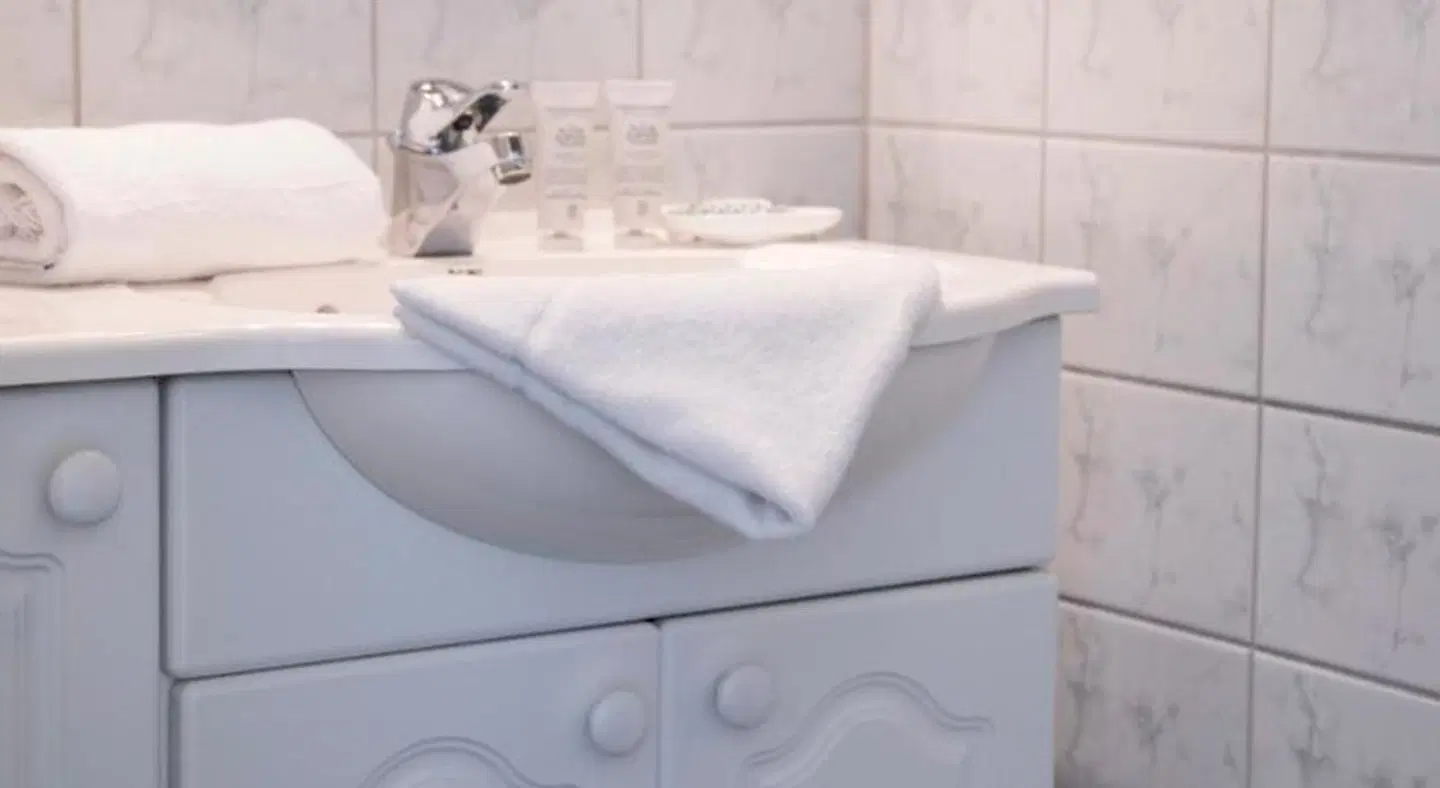 Sandkaas Badehotel Badezimmer