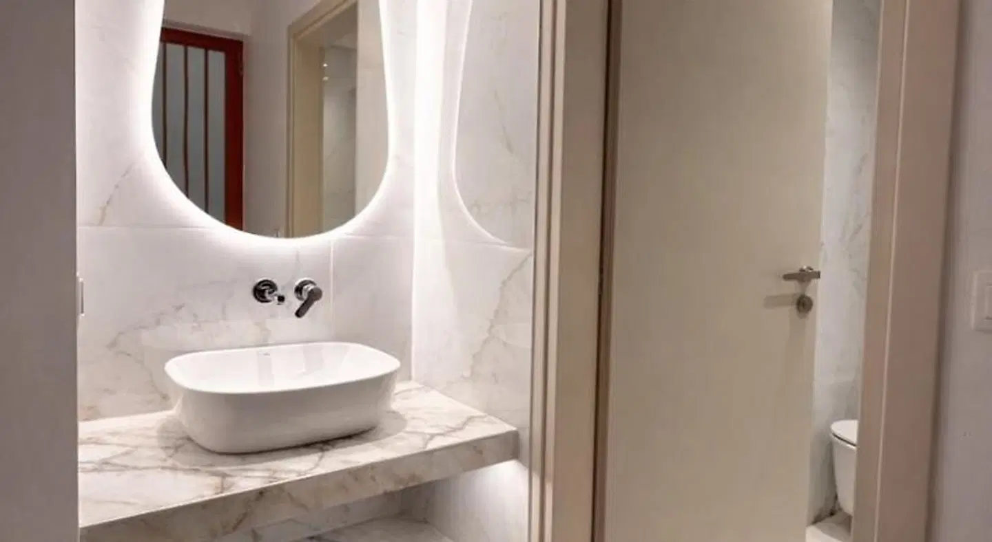 Golden Sun Hotel & Apartments Badezimmer