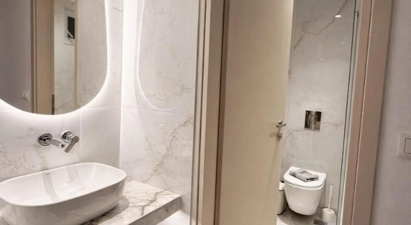 Golden Sun Hotel & Apartments Badezimmer