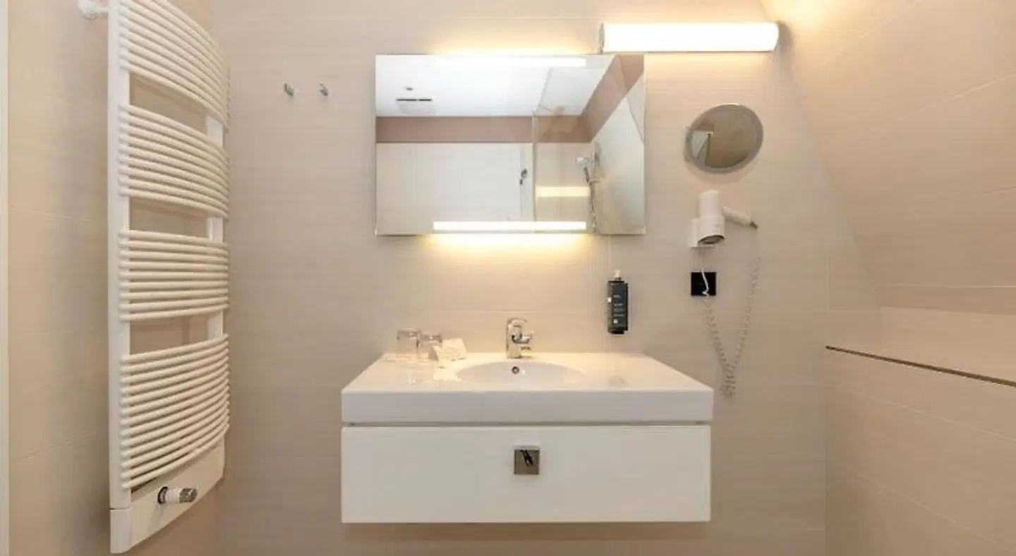 Hotel am Strand Badezimmer