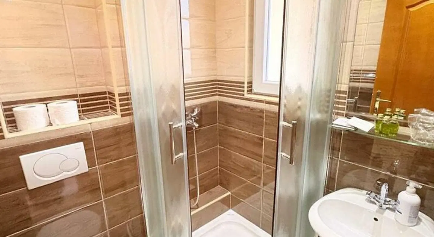 Garni Hotel Bokeka No' Badezimmer