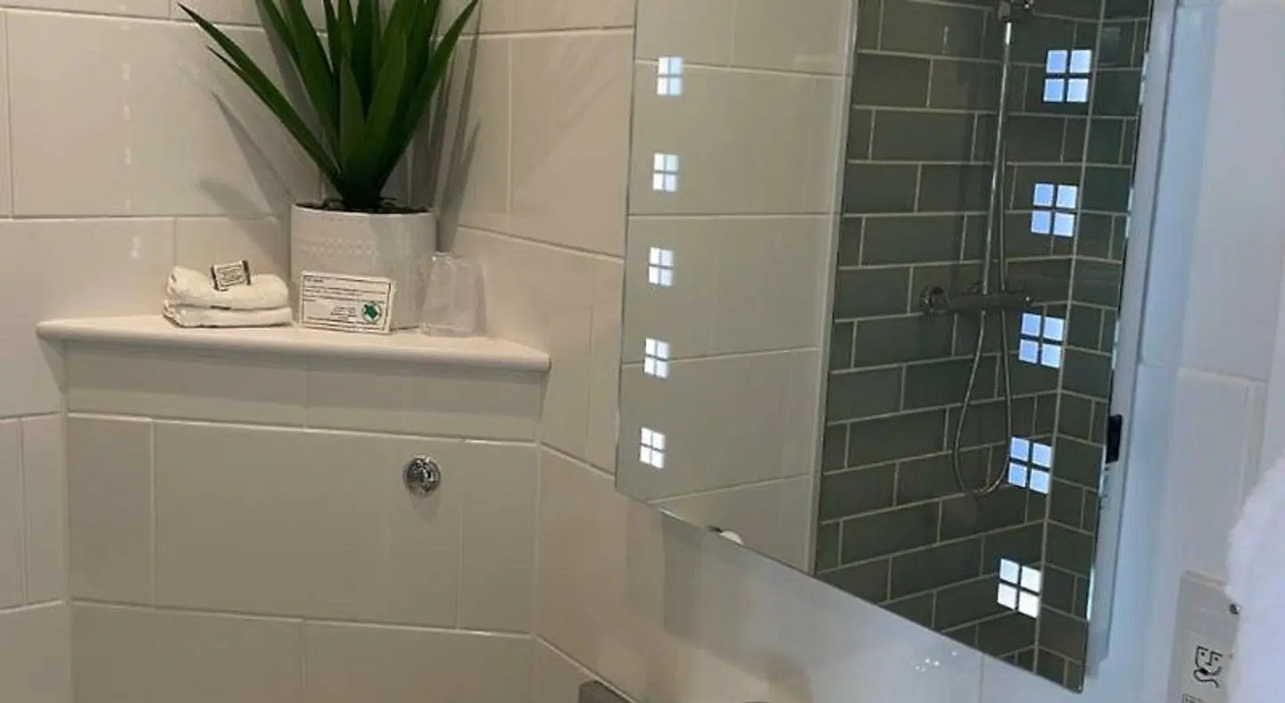 Riviera Apartments Badezimmer