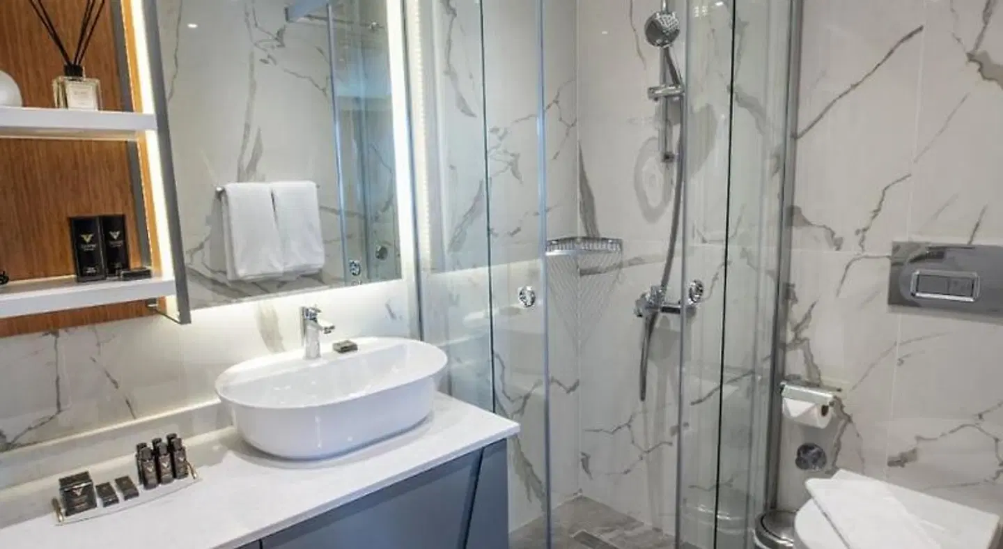 Valente Suites & Hotel Badezimmer
