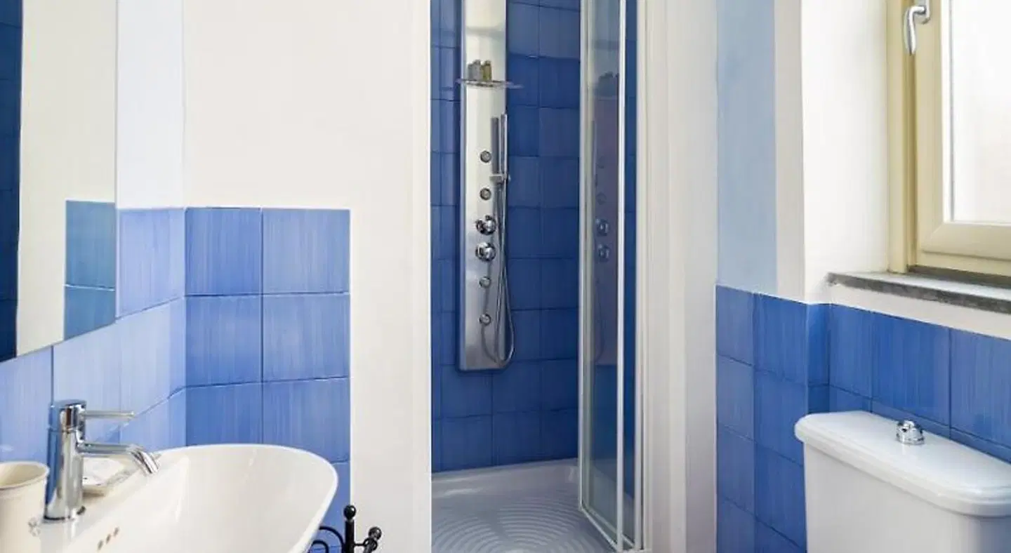 Domus Indomita Apartments Badezimmer